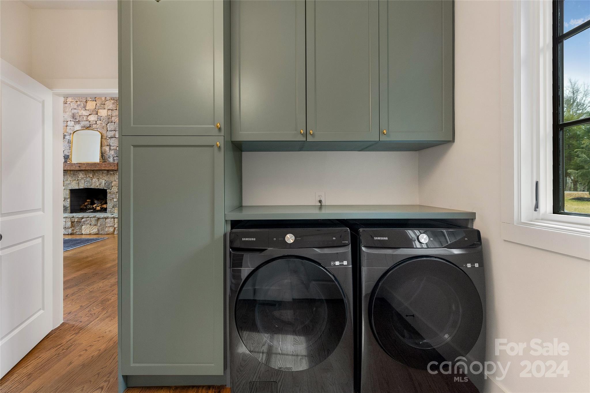 510 Boiling Springs Road Sapphire, NC 28774 - Photo 40 of 48 a utility room with dryer and washer