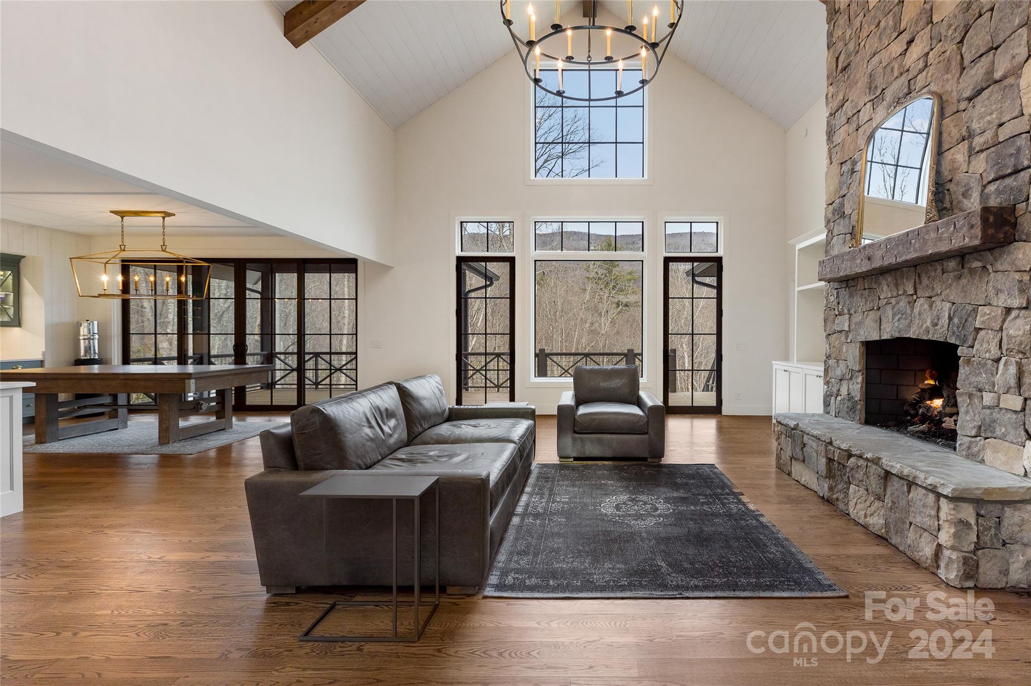 510 Boiling Springs Road Sapphire, NC 28774 - Photo 5 of 48 a living room with furniture and a fireplace