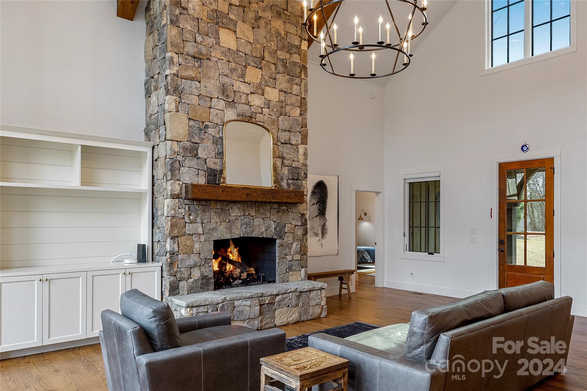 510 Boiling Springs Road Sapphire, NC 28774 - Photo 8 of 48 a living room with furniture and a fireplace