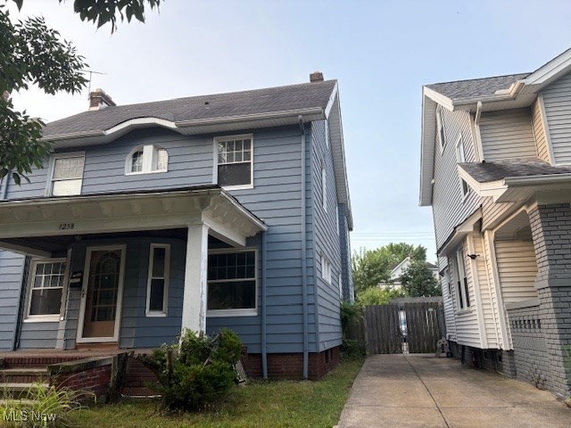 3258 Berkshire Road Cleveland, OH 44118 - Photo 3 of 23 View of home's exterior with a chimney and a porch