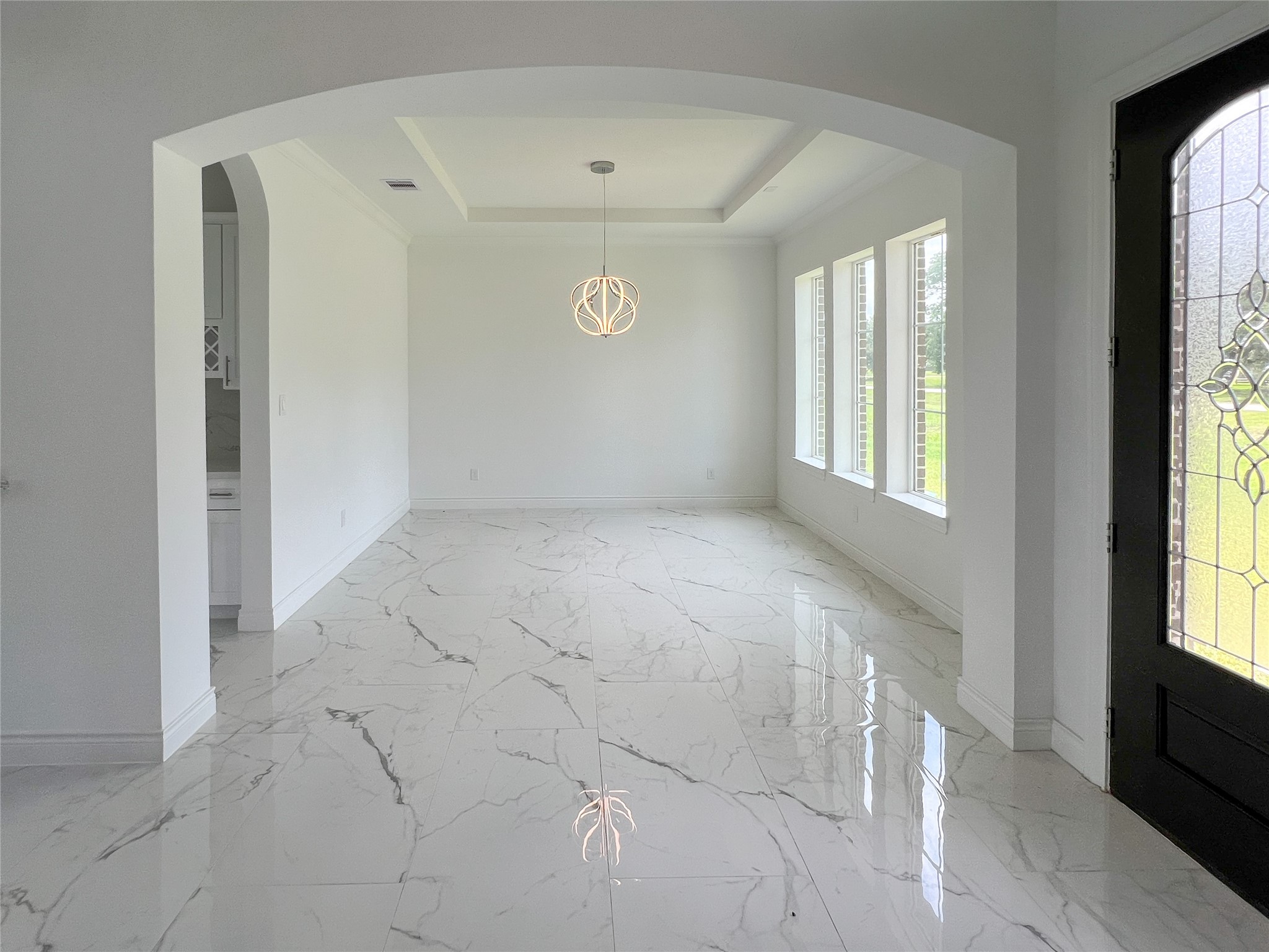 126 Lakeland Circle Rosharon, TX 77583 - Photo 13 of 49 Dining area as you enter this costume stunning home.