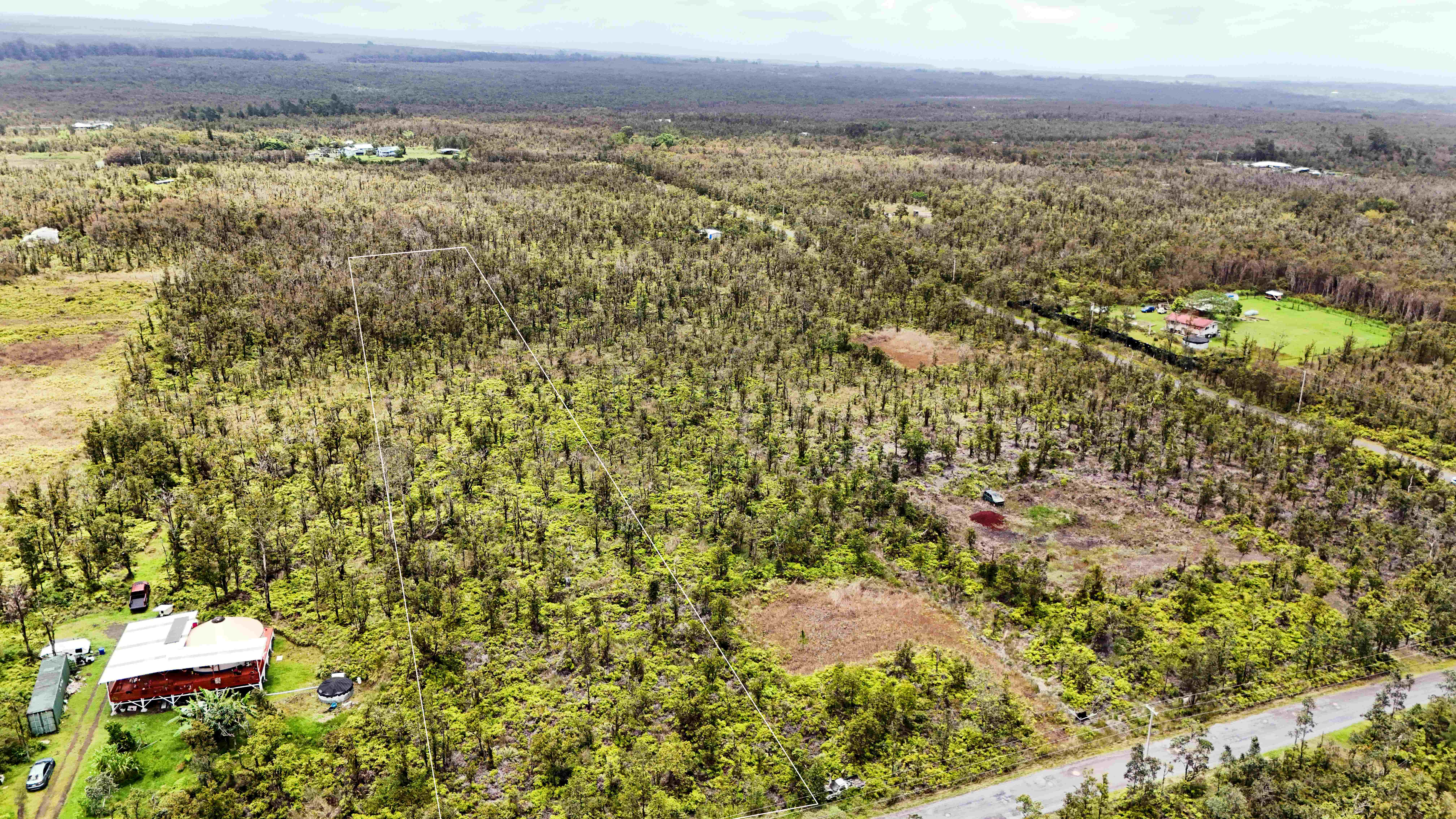 48 Omeka Road Mountain View, HI 96771 - Photo 1 of 8 a view of a green field