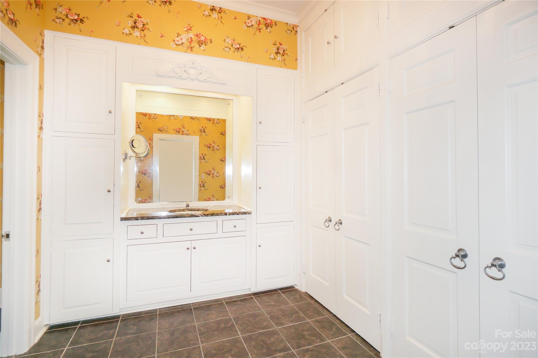 620 North 9th Street, Unit 5/6 Albemarle, NC 28001 - Photo 24 of 48 a bathroom with a sink and a mirror