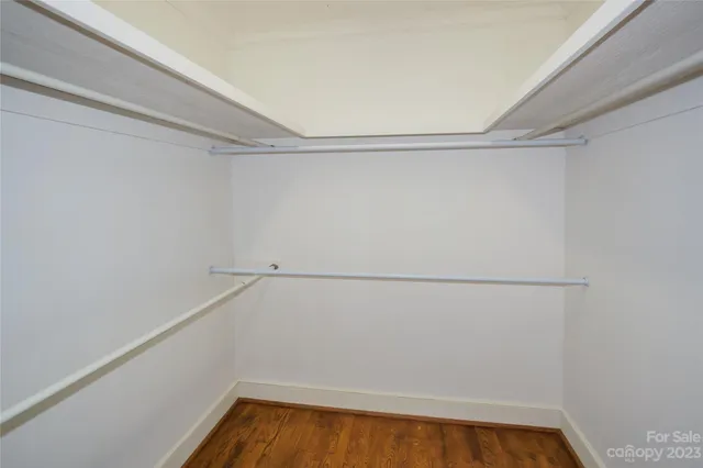 a view of a room with racks on the wall