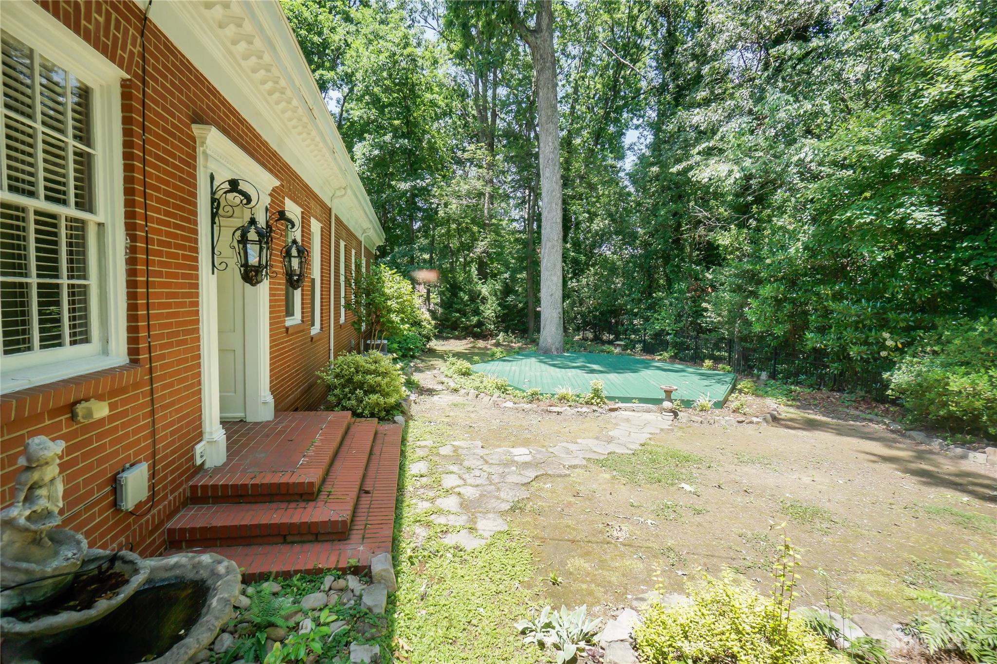 620 North 9th Street, Unit 5/6 Albemarle, NC 28001 - Photo 39 of 48 a view of a house with backyard and sitting area