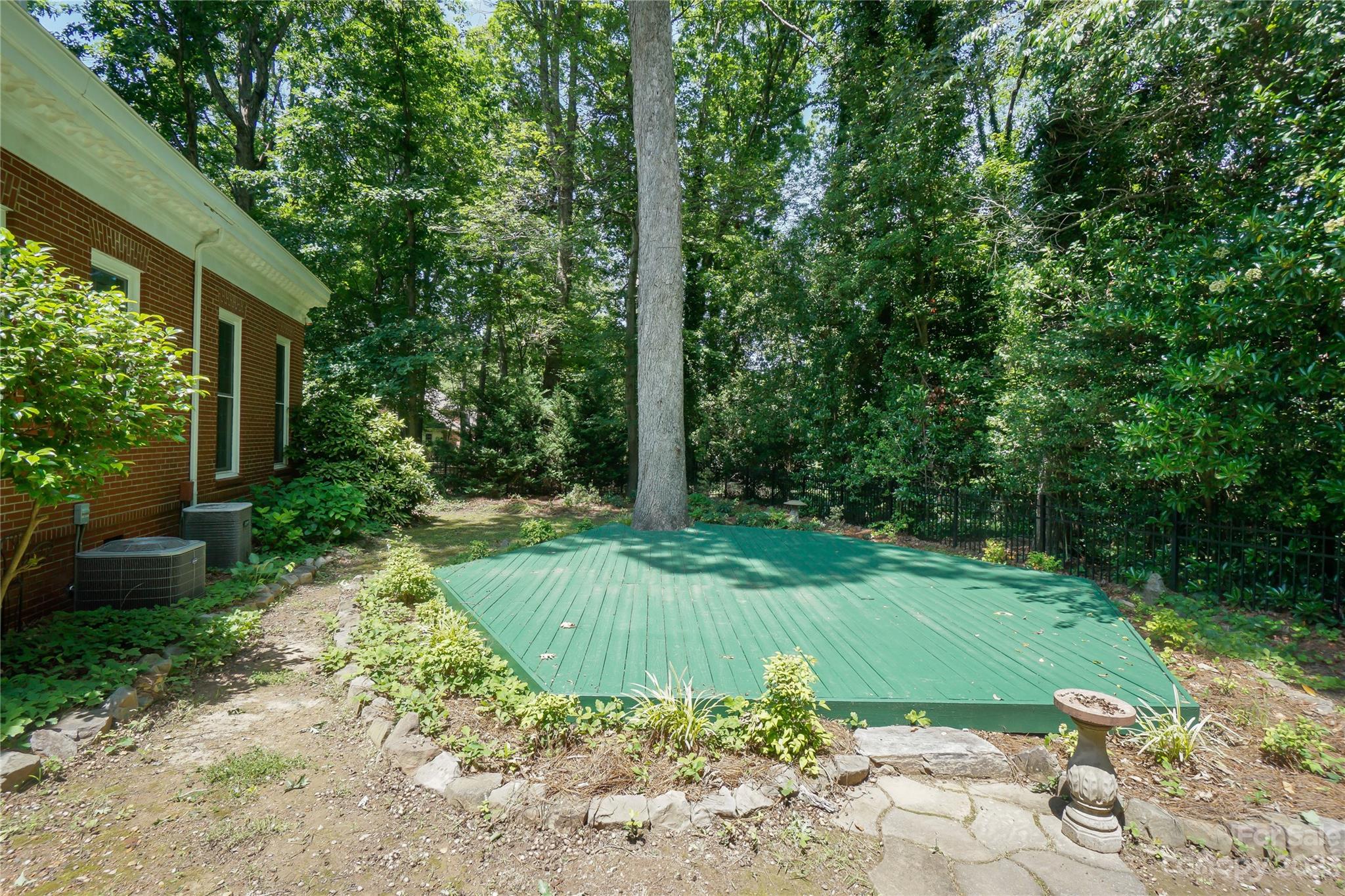620 North 9th Street, Unit 5/6 Albemarle, NC 28001 - Photo 40 of 48 a view of a backyard with large trees