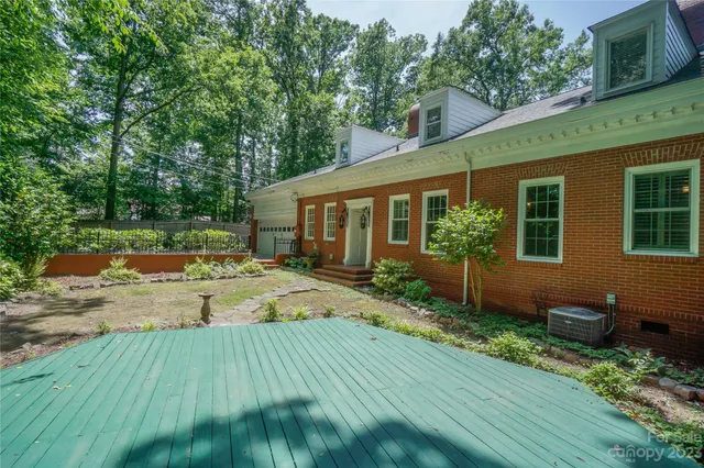 a view of a porch with a floor to ceiling window