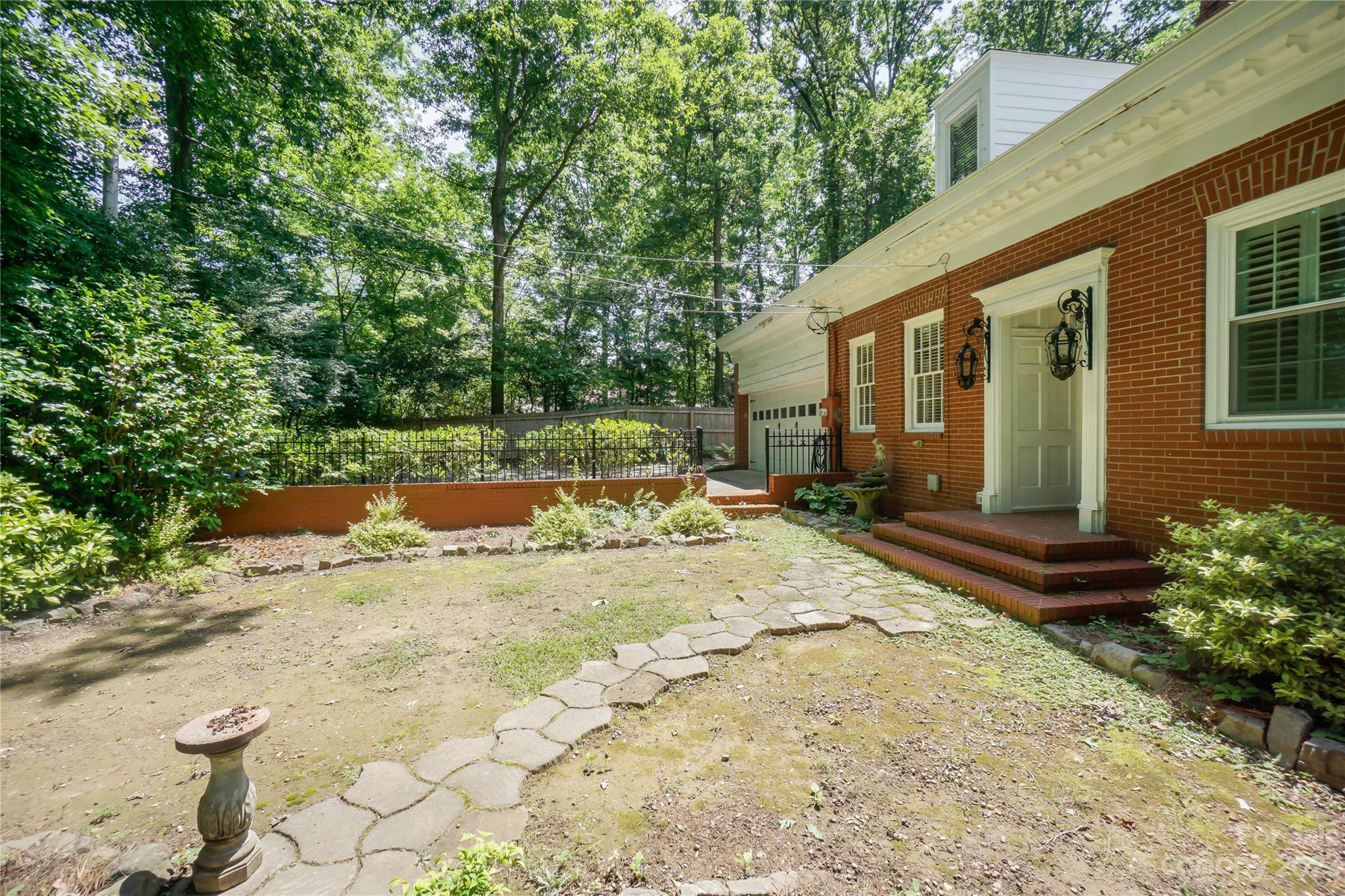 620 North 9th Street, Unit 5/6 Albemarle, NC 28001 - Photo 43 of 48 a view of a house with a yard