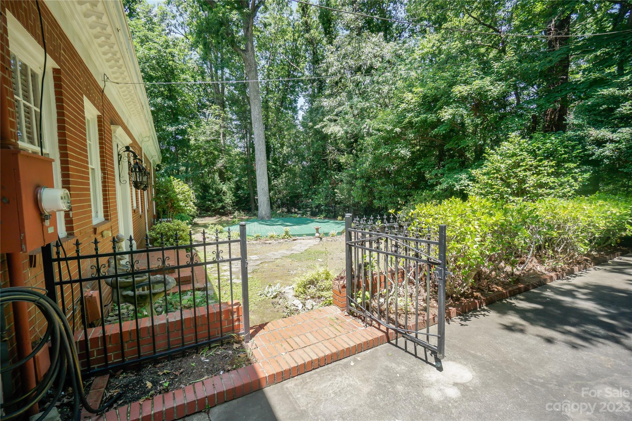 620 North 9th Street, Unit 5/6 Albemarle, NC 28001 - Photo 44 of 48 a view of a porch with a floor to ceiling window