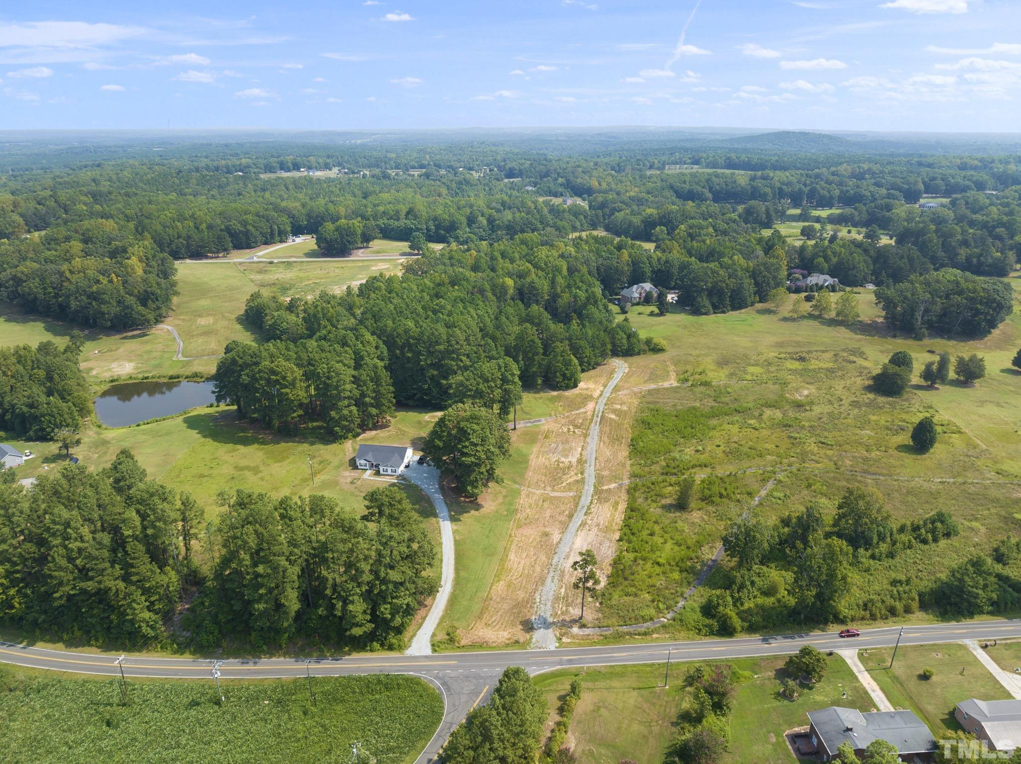Lot D Chub Lake Road Roxboro, NC 27574 - Photo 20 of 29 an aerial view of residential houses with outdoor space