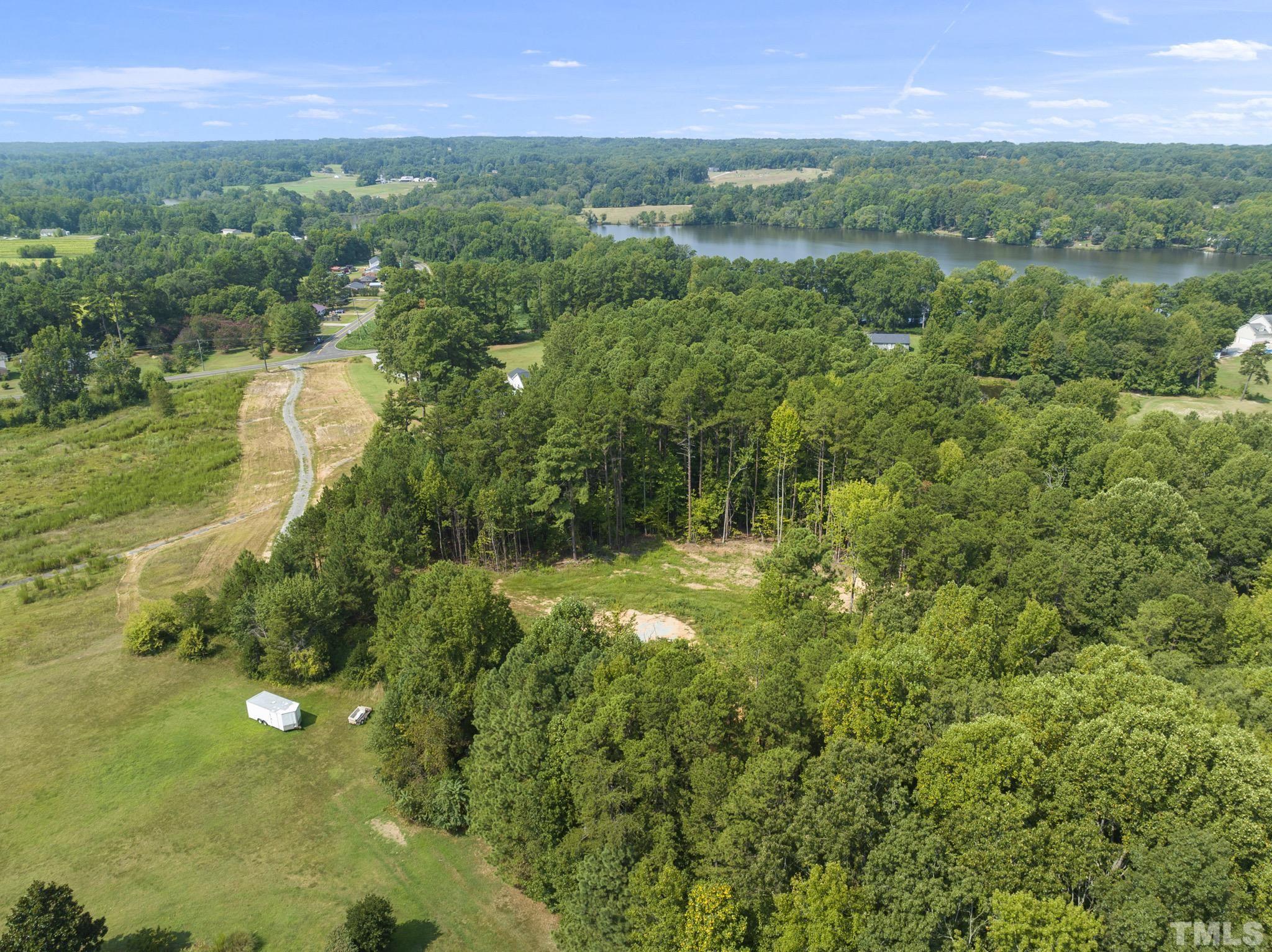 Lot D Chub Lake Road Roxboro, NC 27574 - Photo 26 of 29 a view of a lush green forest with lots of trees