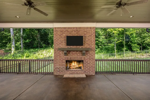 a view of outdoor space deck and fireplace