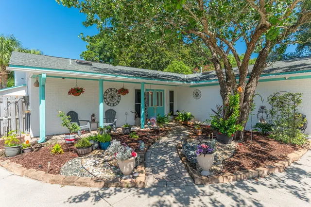 a view of a swimming pool with an outdoor space and seating area