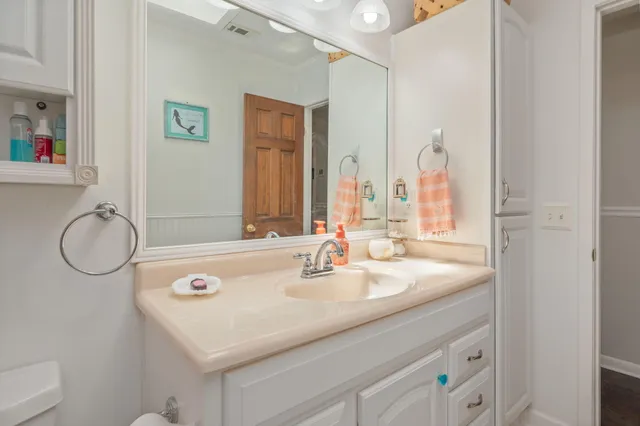 a kids room with toys and a window