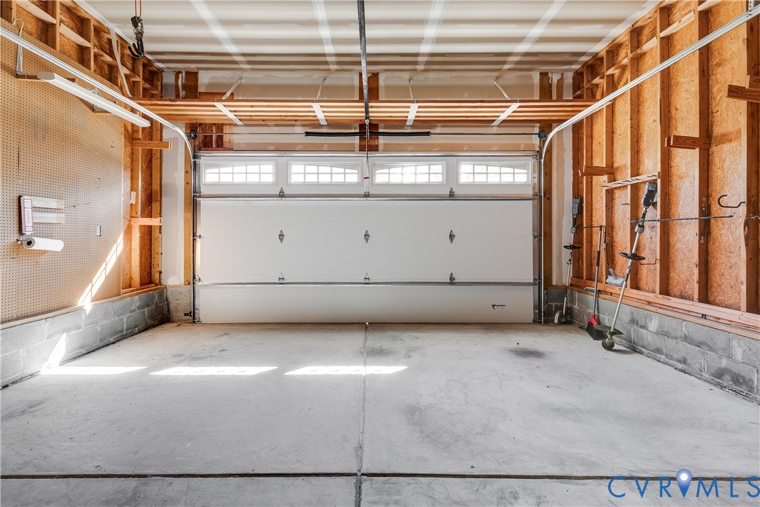 7538 South Franklins Way Quinton, VA 23141 - Photo 38 of 48 a view of a garage with wooden walls