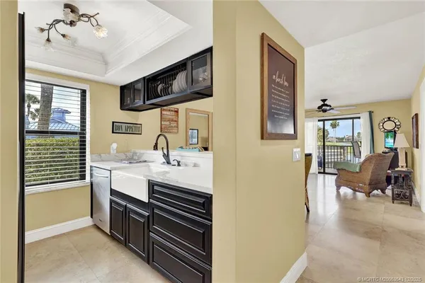 a spacious bathroom with a sink double vanity and a mirror
