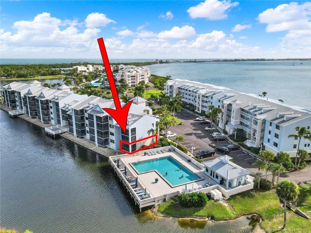 40 Northeast Plantation Road, Unit 101 Stuart, FL 34996 - Photo 2 of 37 a view of a city with lawn chairs