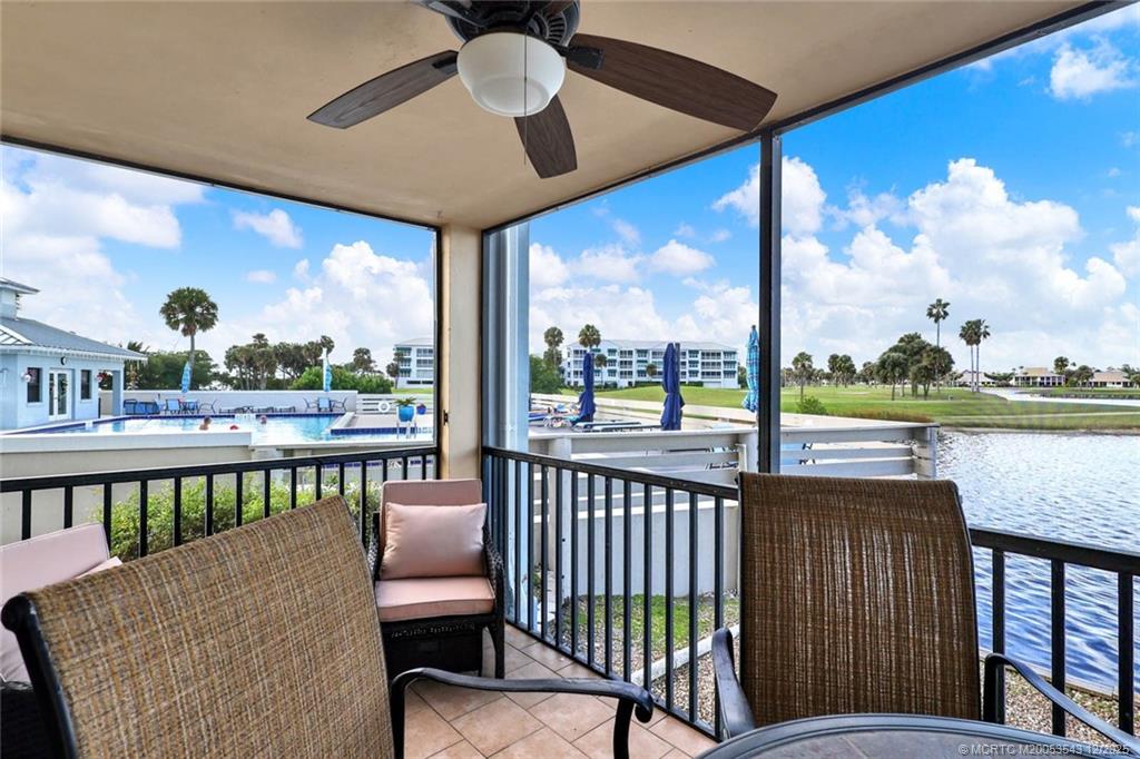 40 Northeast Plantation Road, Unit 101 Stuart, FL 34996 - Photo 24 of 37 a view of a chairs and table in the balcony