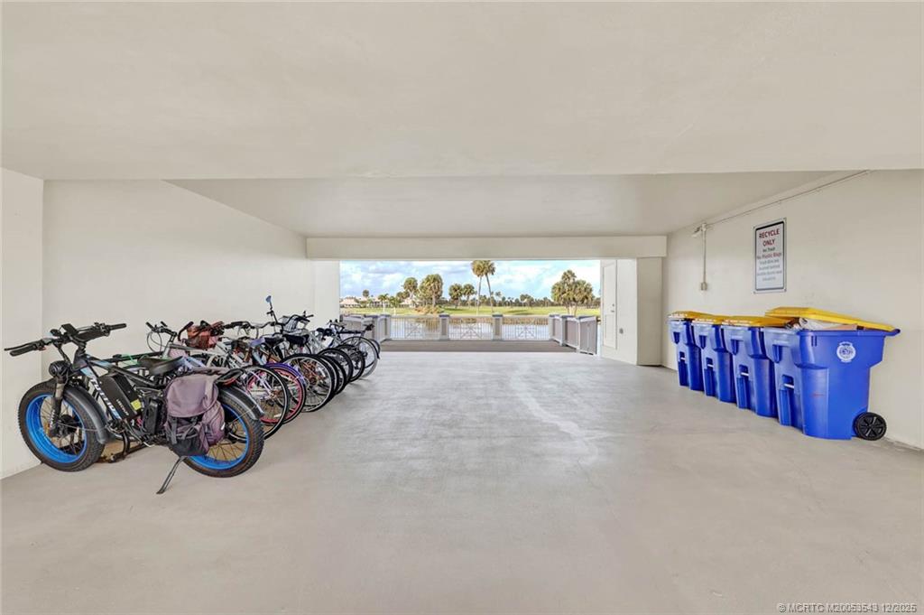 40 Northeast Plantation Road, Unit 101 Stuart, FL 34996 - Photo 29 of 37 a view of a car garage