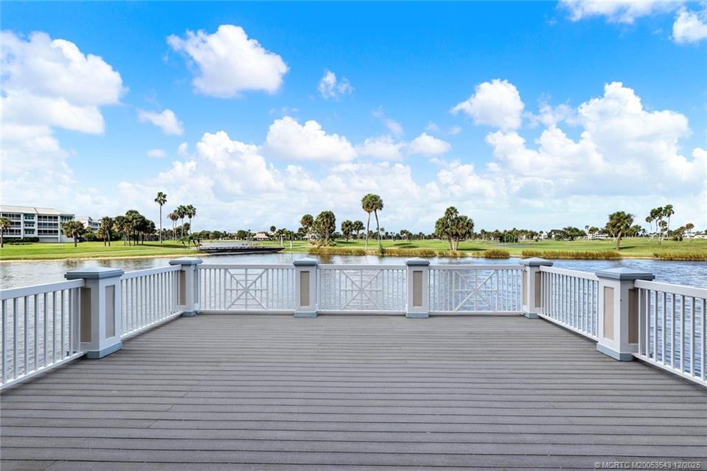 40 Northeast Plantation Road, Unit 101 Stuart, FL 34996 - Photo 30 of 37 a view of a swimming pool and a terrace