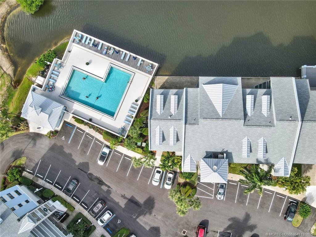 40 Northeast Plantation Road, Unit 101 Stuart, FL 34996 - Photo 31 of 37 an aerial view of a house with outdoor space