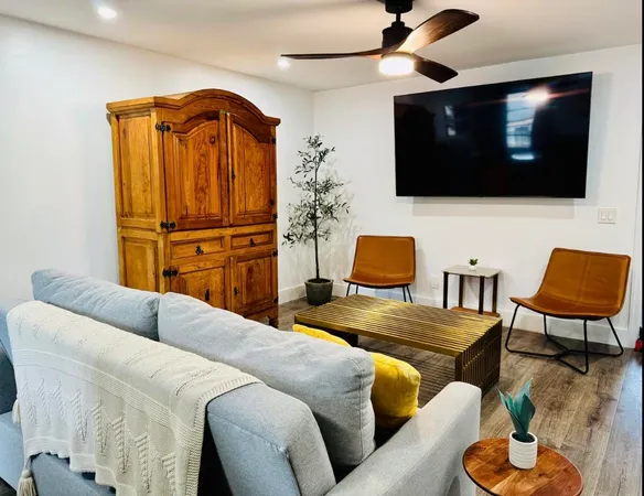 a bedroom with a bed and dresser