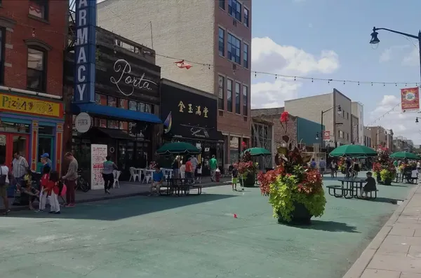 a view of street with sitting area