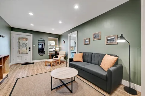 a living room with furniture and a couch