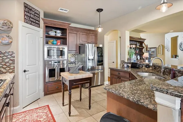 a view of a kitchen and dining room