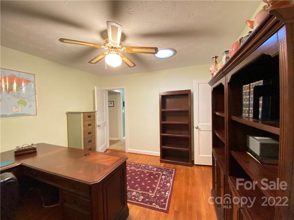 19 Osborne Road Asheville, NC 28804 - Photo 20 of 35 a room with furniture and a chandelier