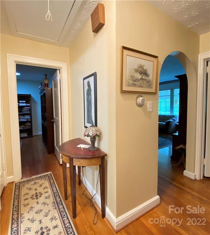 19 Osborne Road Asheville, NC 28804 - Photo 21 of 35 a view of a hallway to a livingroom with furniture