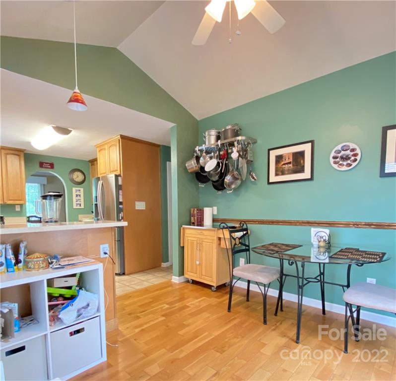 19 Osborne Road Asheville, NC 28804 - Photo 8 of 35 a view of a workspace with furniture and a kitchen