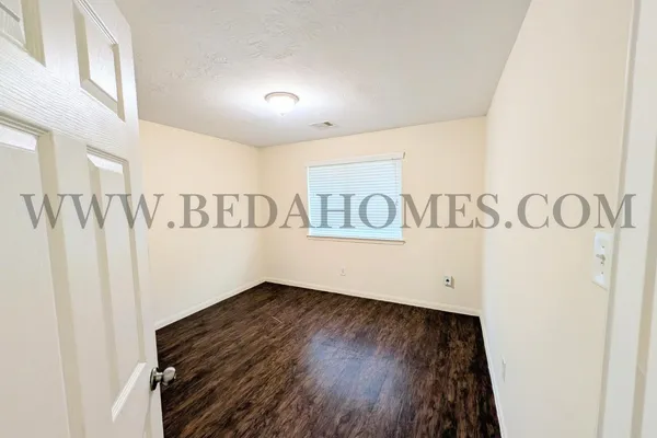 a view of a hallway with entryway