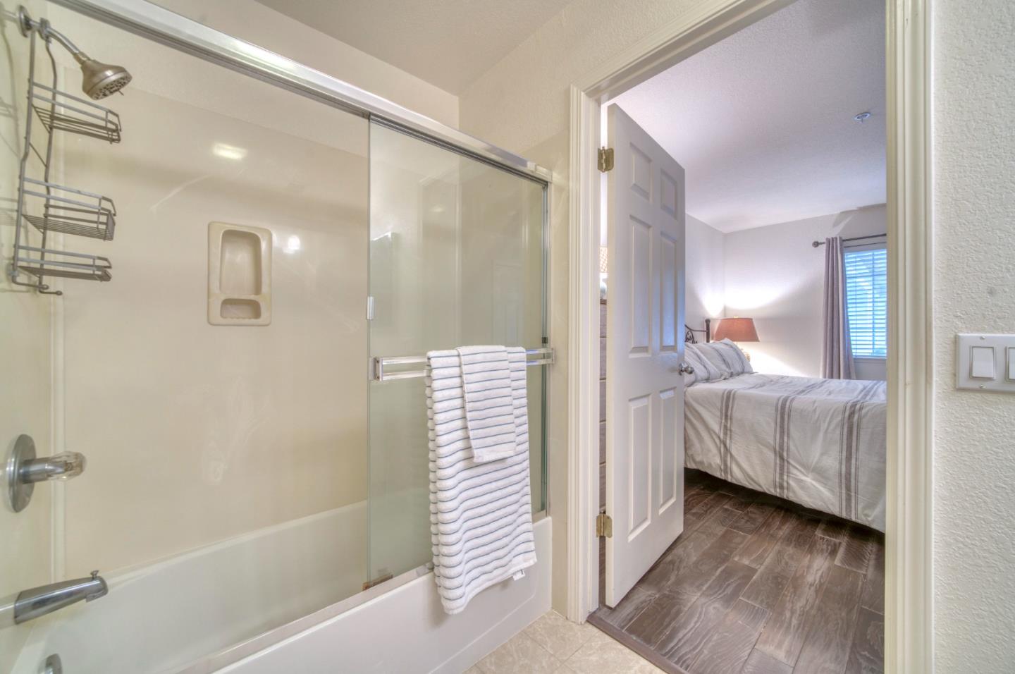 121 Skyline Drive San Ramon, CA 94583 - Photo 22 of 38 a en suite bathroom with a bathtub and a shower