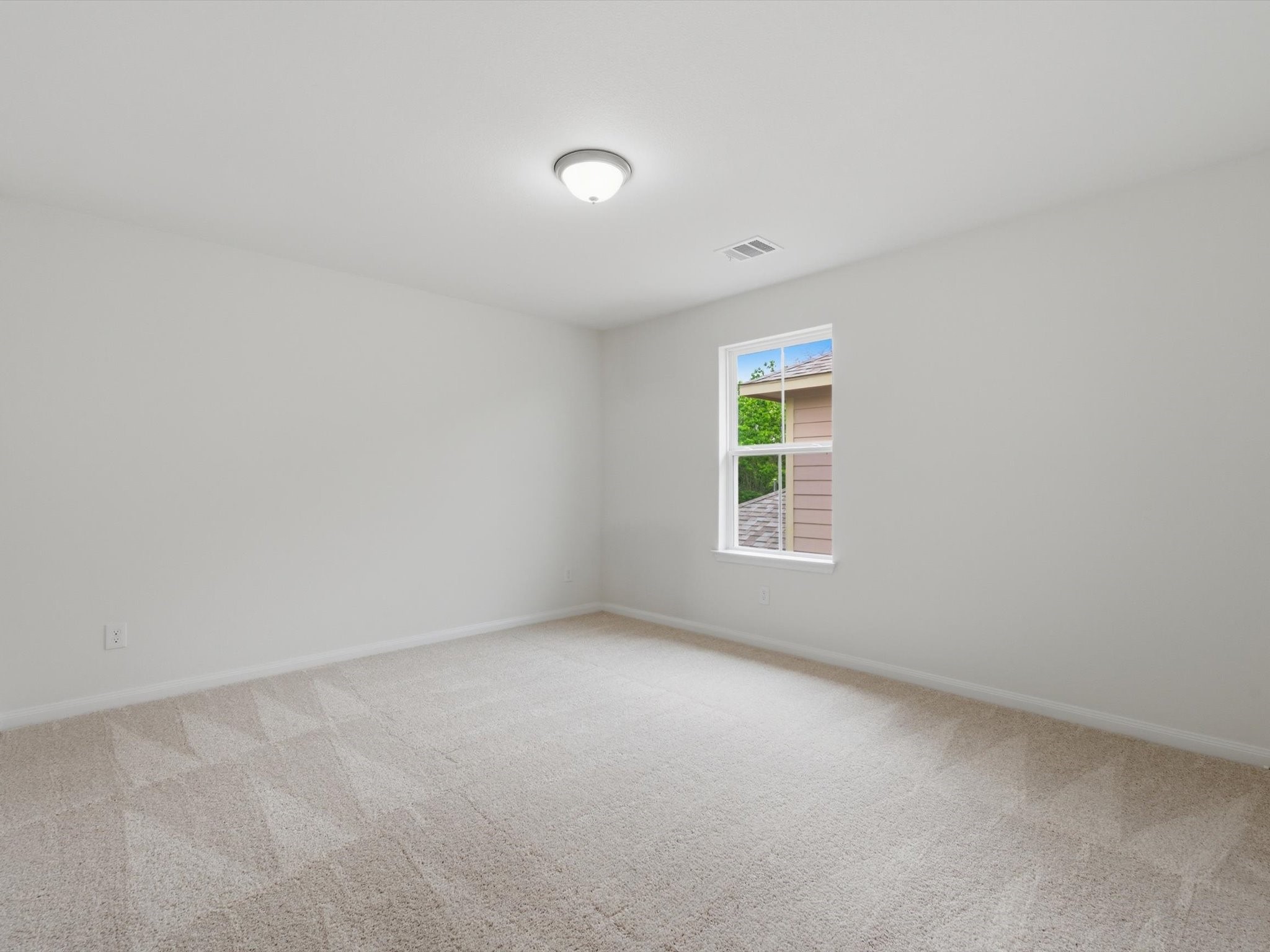 2803 Topiary Lane Houston, TX 77014 - Photo 23 of 31 Well-proportioned secondary bedrooms create comfortable spaces that easily adapt to guests, family, or work-from-home living.