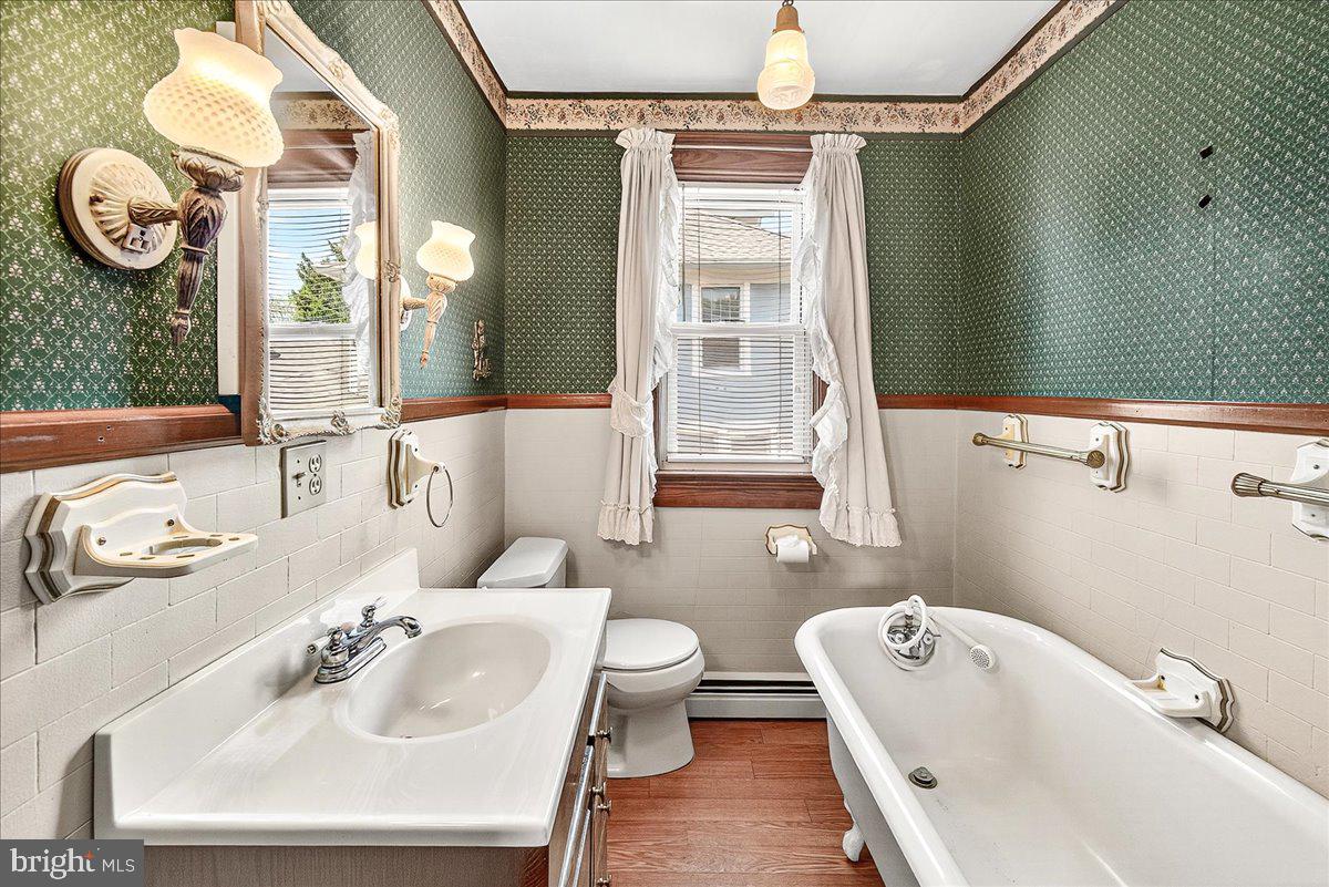 206 Prospect Street Middletown, MD 21769 - Photo 16 of 47 a bathroom with a sink and a mirror