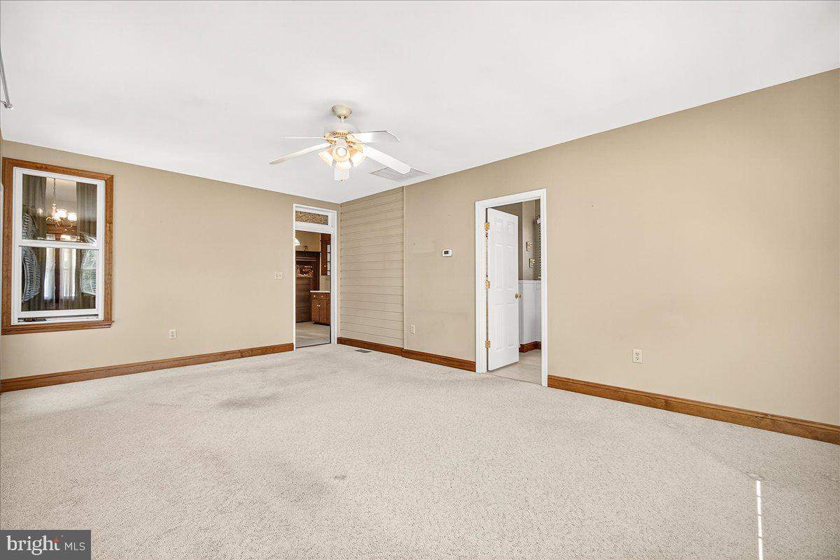 206 Prospect Street Middletown, MD 21769 - Photo 24 of 47 an empty room with windows and closet