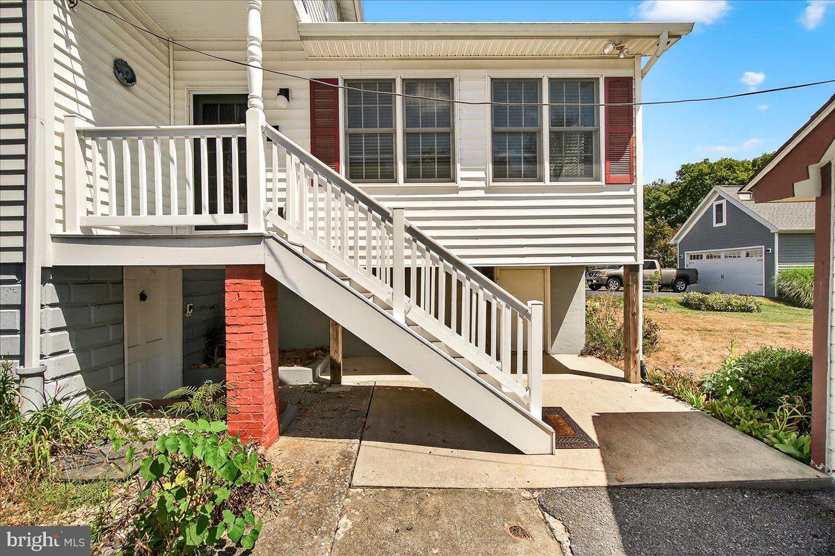 206 Prospect Street Middletown, MD 21769 - Photo 26 of 47 a view of a house with wooden stairs