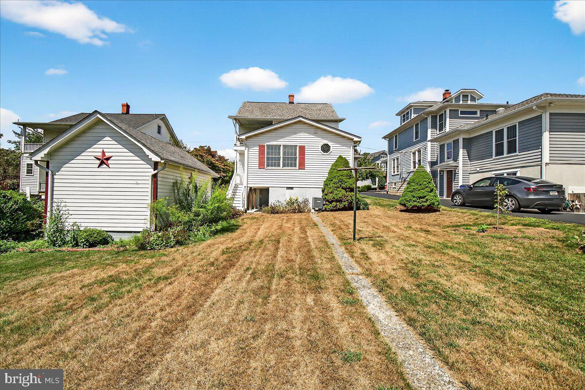 206 Prospect Street Middletown, MD 21769 - Photo 28 of 47 a front view of a house with a yard