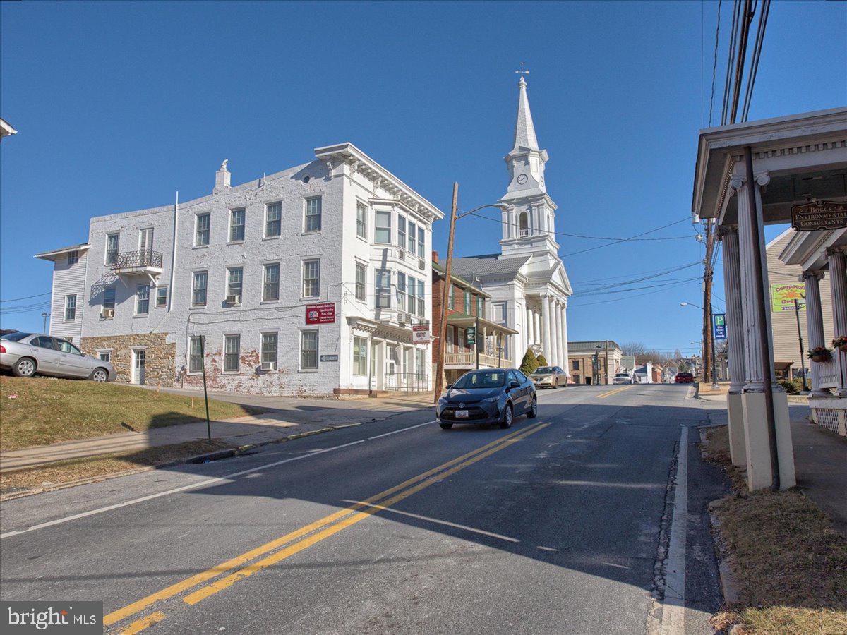 206 Prospect Street Middletown, MD 21769 - Photo 32 of 47 a city street lined with buildings and cars