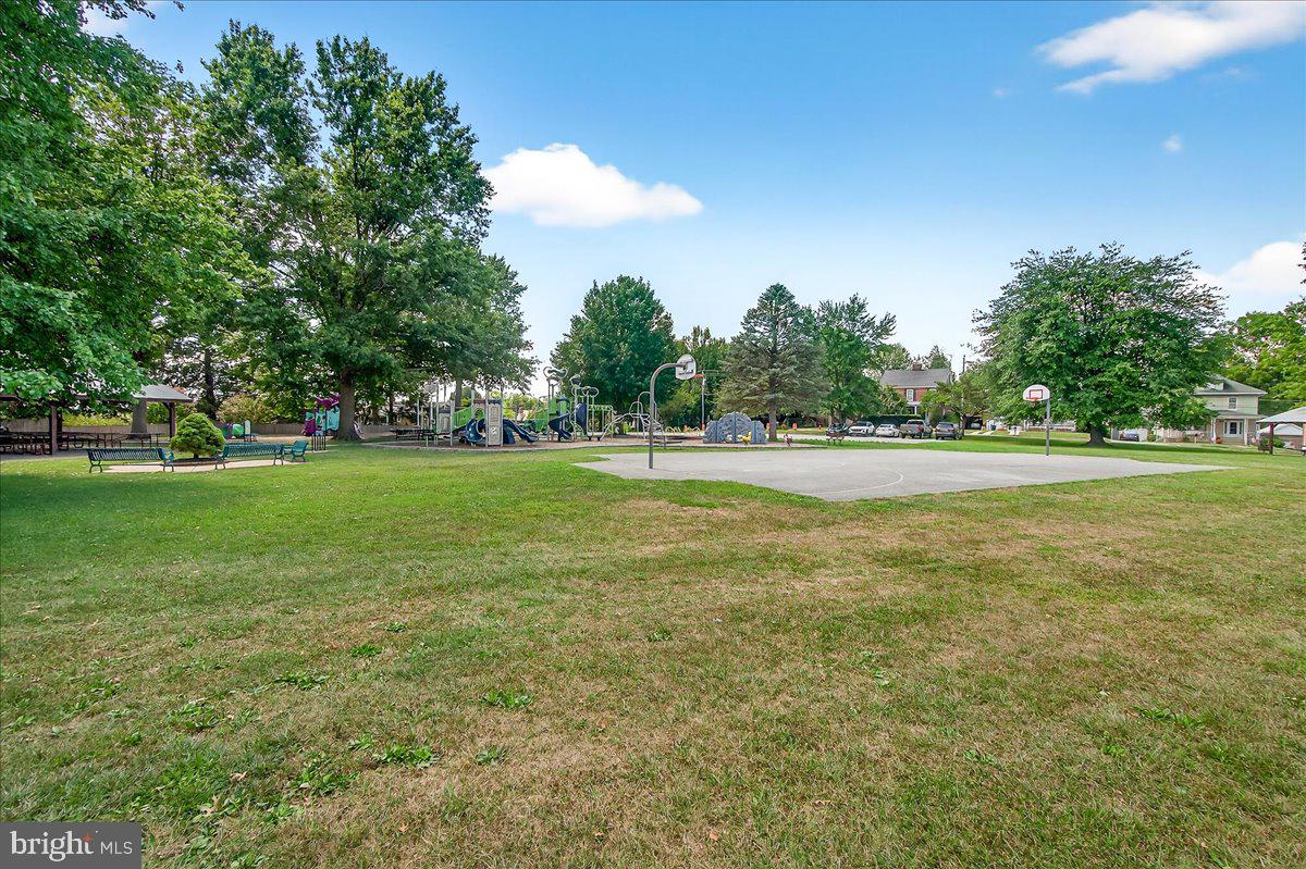 206 Prospect Street Middletown, MD 21769 - Photo 36 of 47 a view of a green field with trees in the background