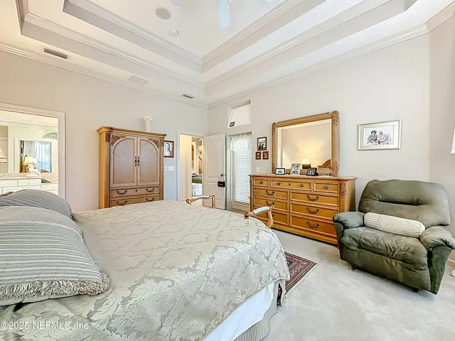 a bathroom with a shower sink and mirror