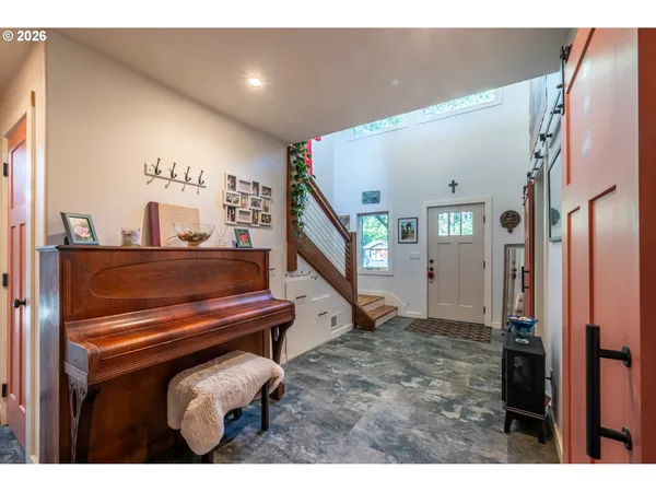 a view of a livingroom with furniture and window