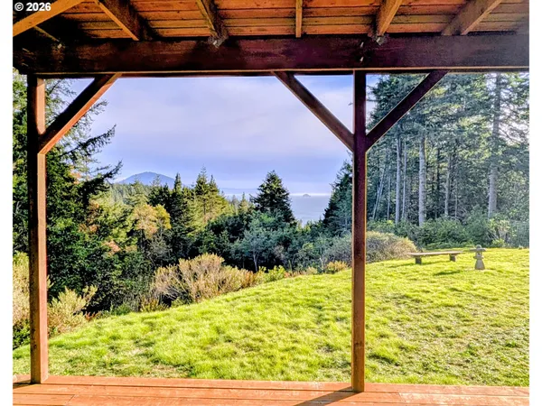 a workspace with furniture and a ceiling fan