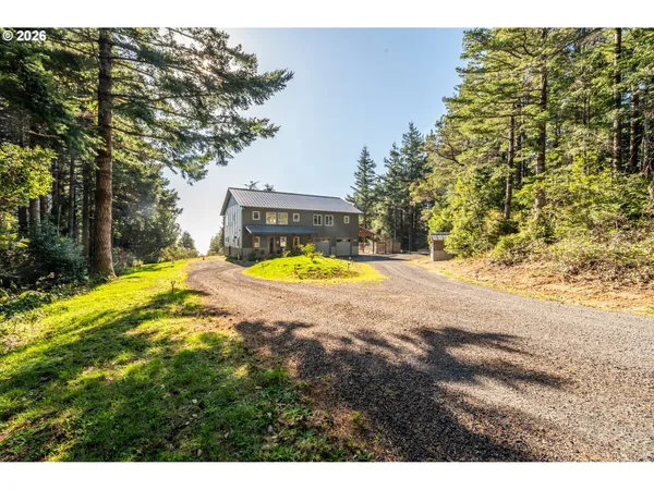 a view of a swimming pool with an outdoor space and seating area
