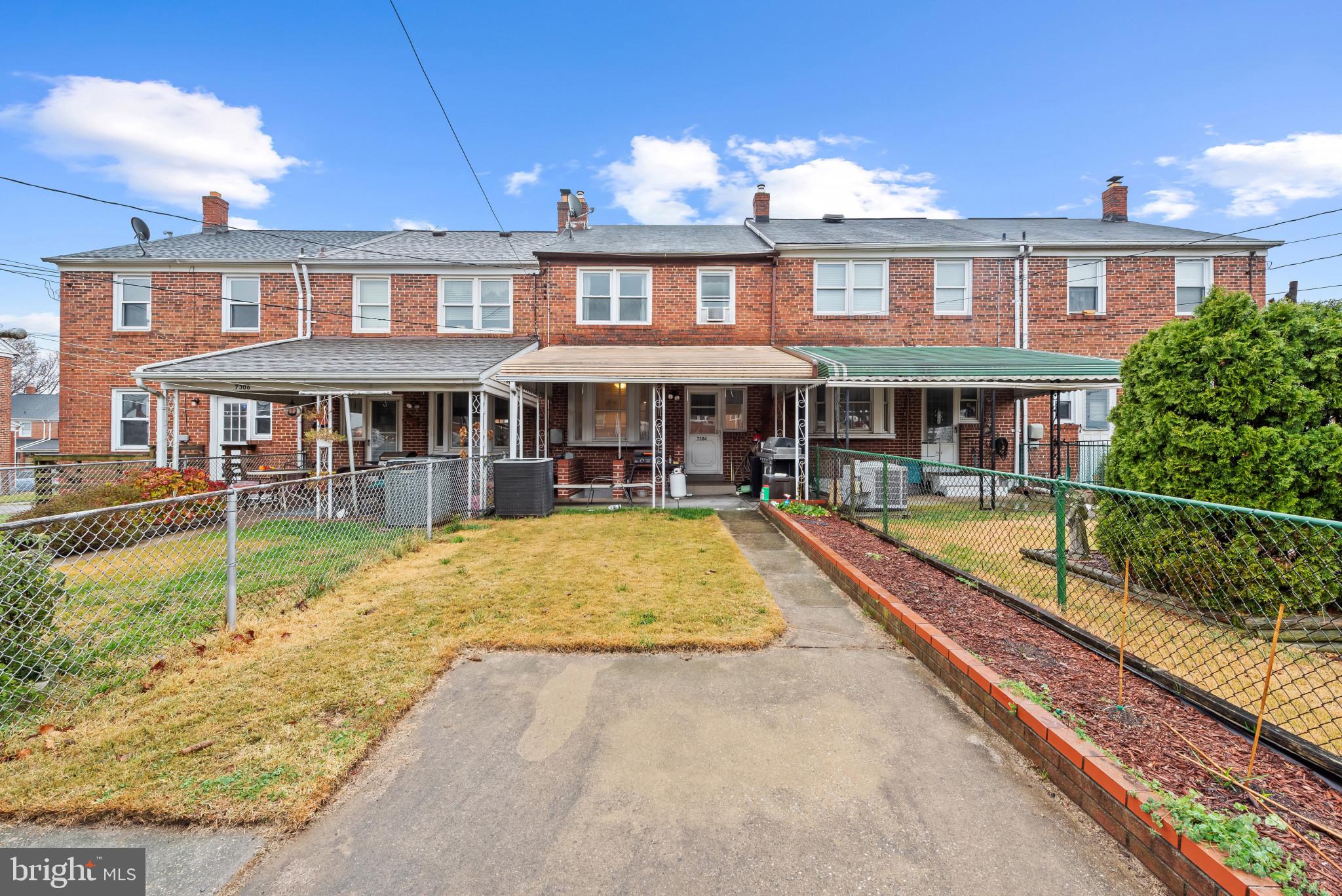 7304 Stratton Way Baltimore, MD 21224 - Photo 30 of 34 View of the rear of the home with parking pad