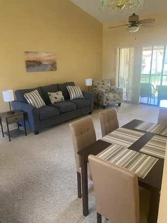 a living room with furniture and a couch