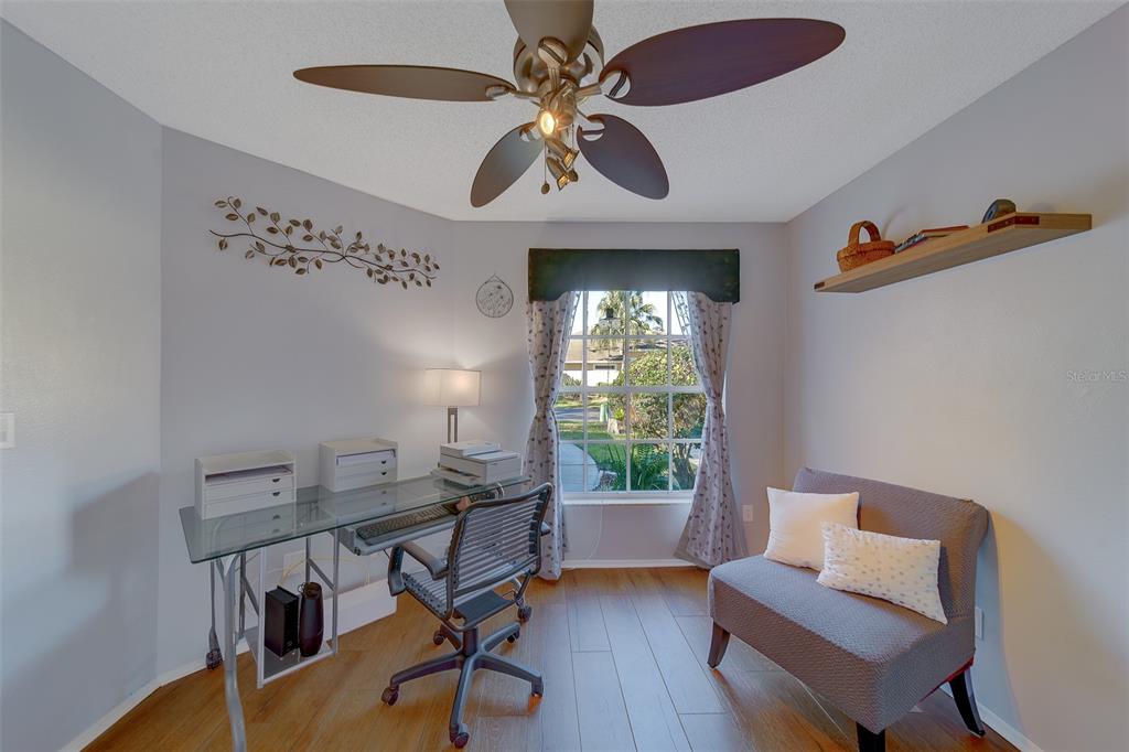 4405 Connery Court Palm Harbor, FL 34685 - Photo 27 of 51 a workspace with furniture and a window