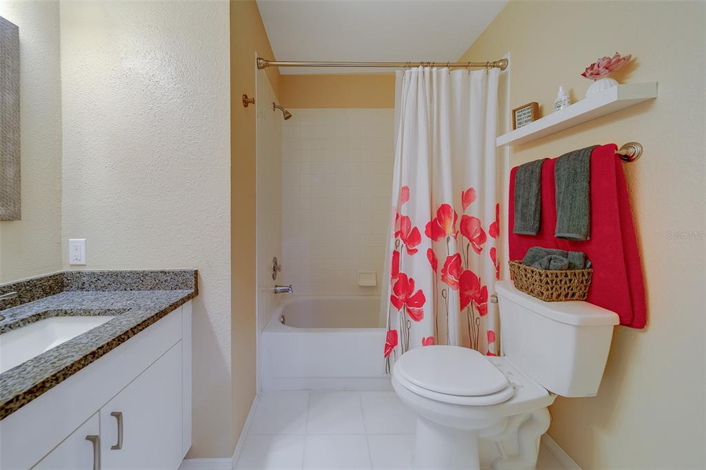 4405 Connery Court Palm Harbor, FL 34685 - Photo 29 of 51 a bathroom with a sink toilet and shower