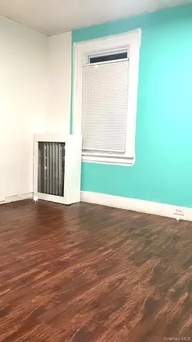 a bedroom with a bed and a cabinets